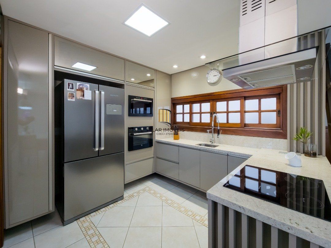 Casa 4 dormitórios no bairro Glória