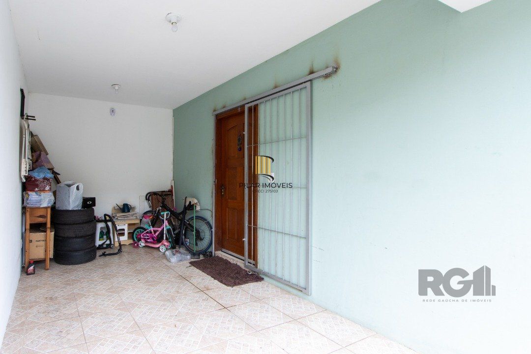 Casa de Condomínio 3 dormitórios no bairro Camaquã