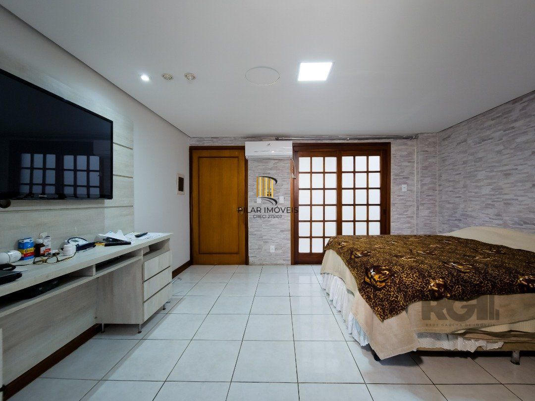 Casa 4 dormitórios no bairro Glória