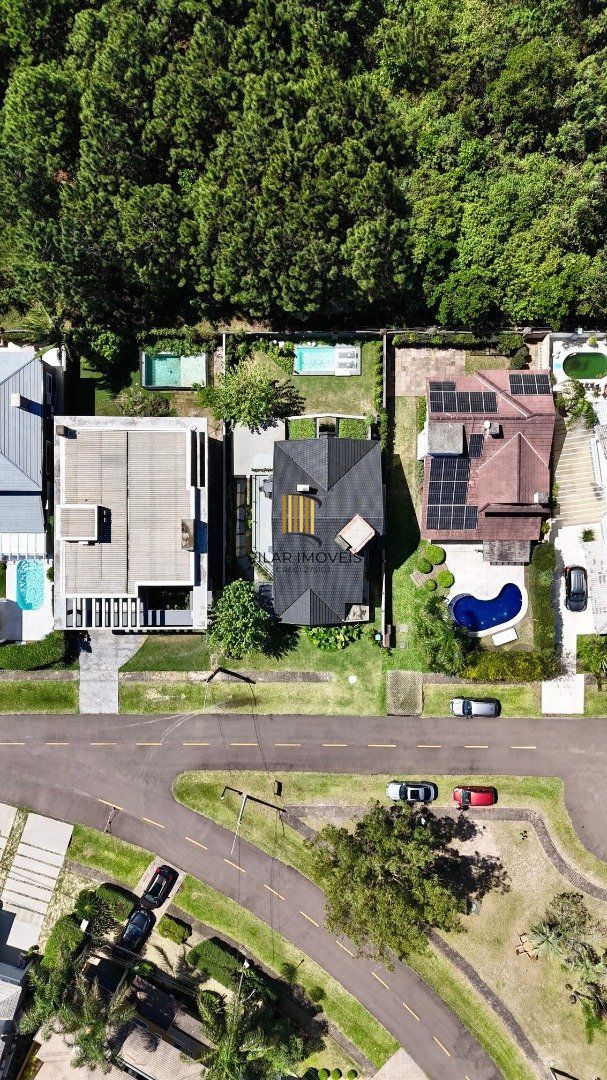 Casa de Condomínio 4 dormitórios no bairro Atlântida