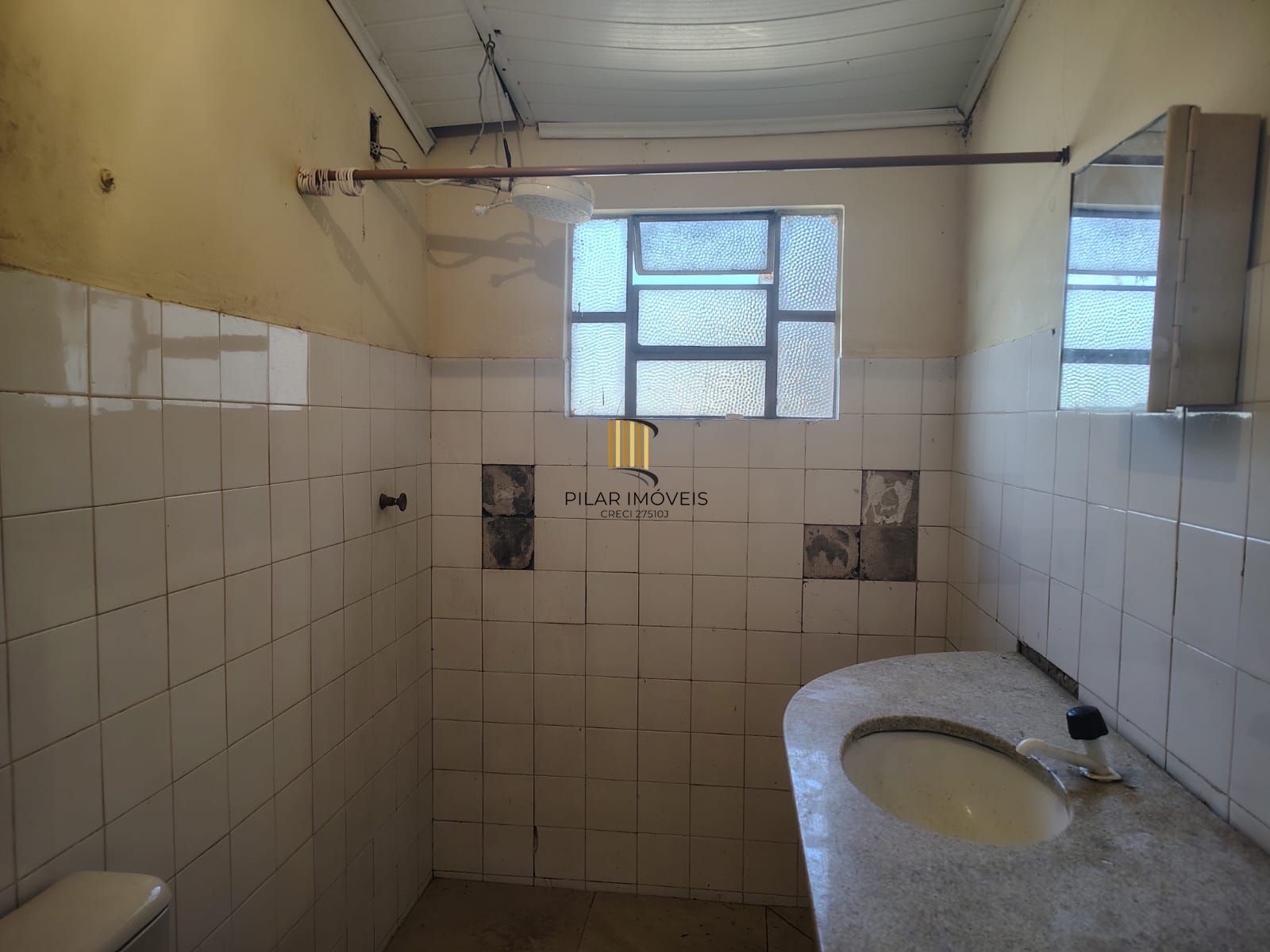 Casa térrea no bairro Vila Nova.