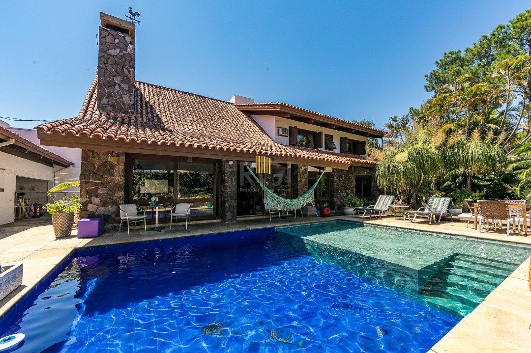 Casa para Venda - 370m², 5 dormitórios, sendo 2 suites, 7 vagas - Vila Assunção