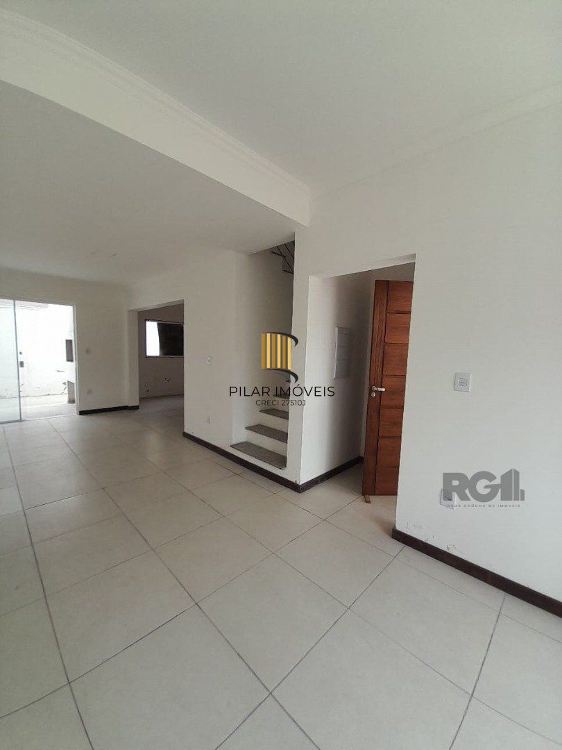 Casa 3 dormitórios no bairro Camaquã
