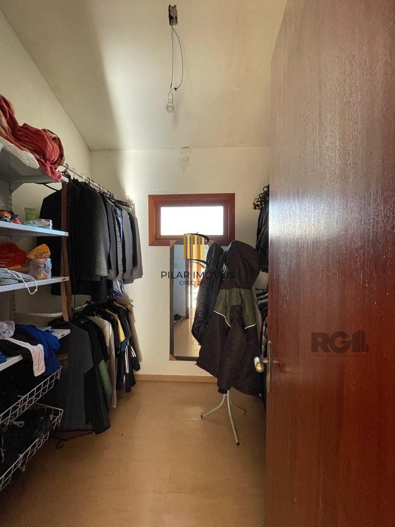 Casa de Condomínio 4 dormitórios no bairro Cavalhada