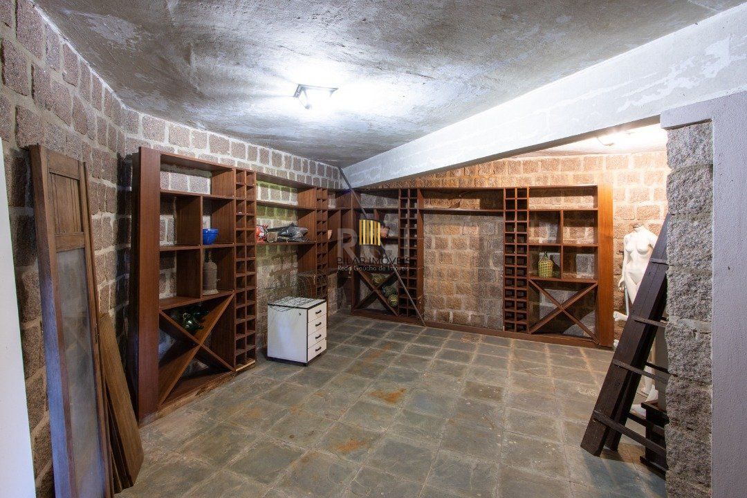 Casa de Condomínio 8 dormitórios no bairro Cavalhada