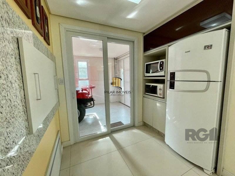Casa de Condomínio 4 dormitórios no bairro Atlântida Sul