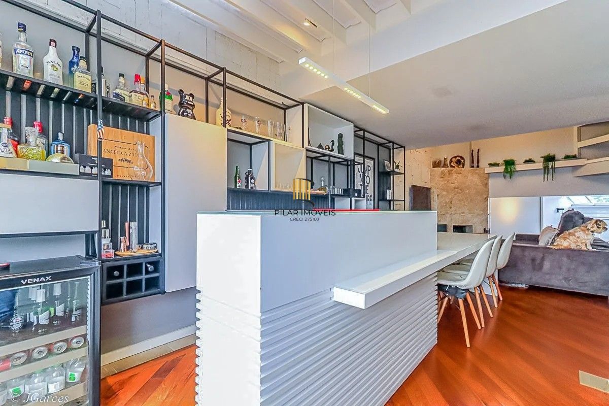 Casa em Condomínio à venda com 286m², 3 dormitórios, 1 suíte, 3 vagas, no bairro Jardim Isabel em Porto Alegre
