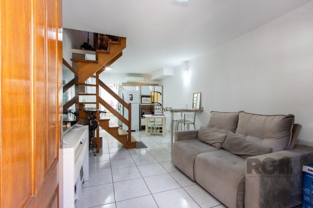 Casa de Condomínio 3 dormitórios no bairro Camaquã