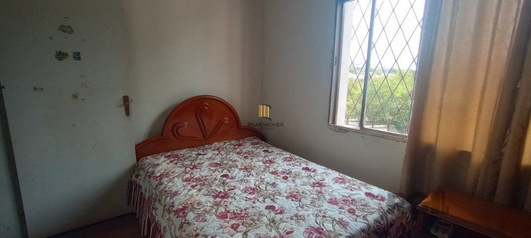 Casa de 3 dormitórios com piscina no Bairro Cristal.