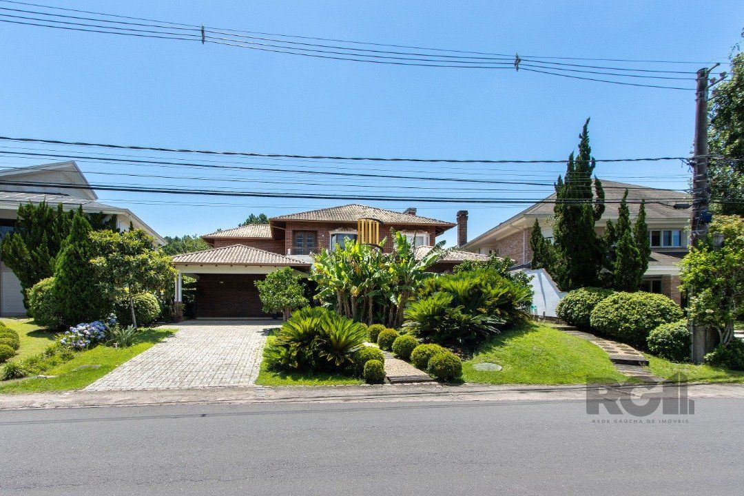 Casa de Condomínio 4 dormitórios no bairro Chapéu do Sol