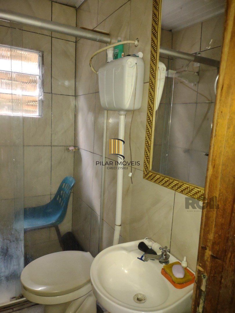 Casa 3 dormitórios no bairro Camaquã