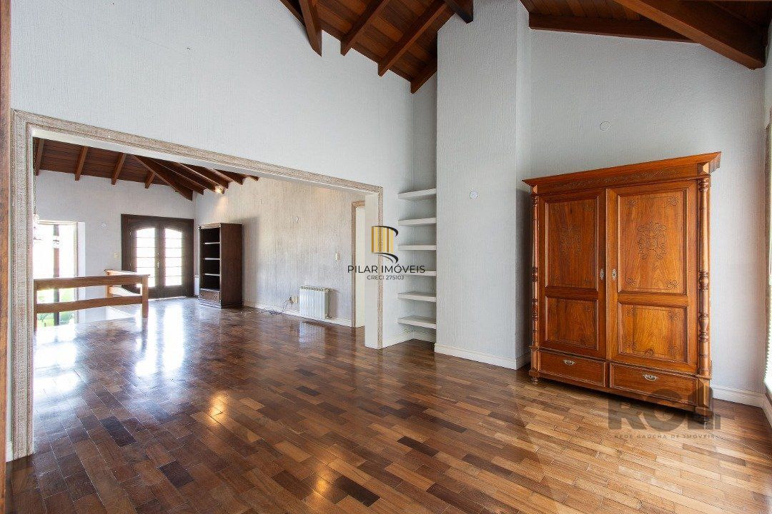 Casa de Condomínio 4 dormitórios no bairro Chapéu do Sol