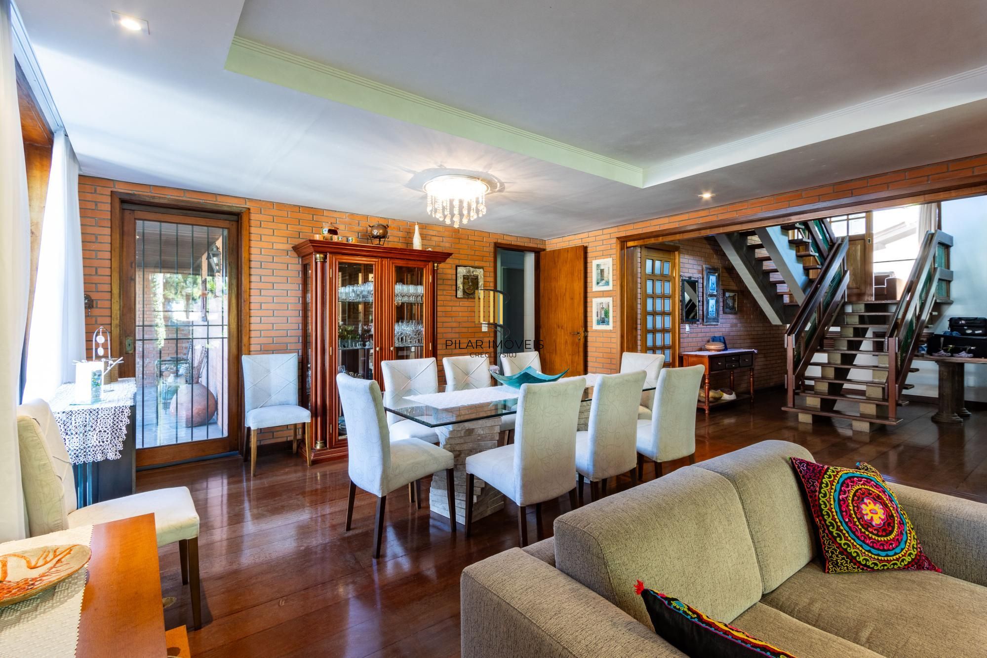 Casa de Condomínio 4 dormitórios no bairro Cavalhada