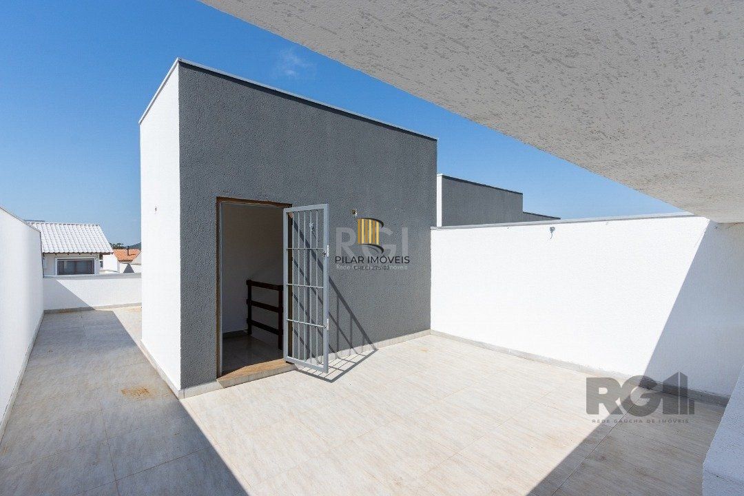 Casa 3 dormitórios no bairro Guarujá