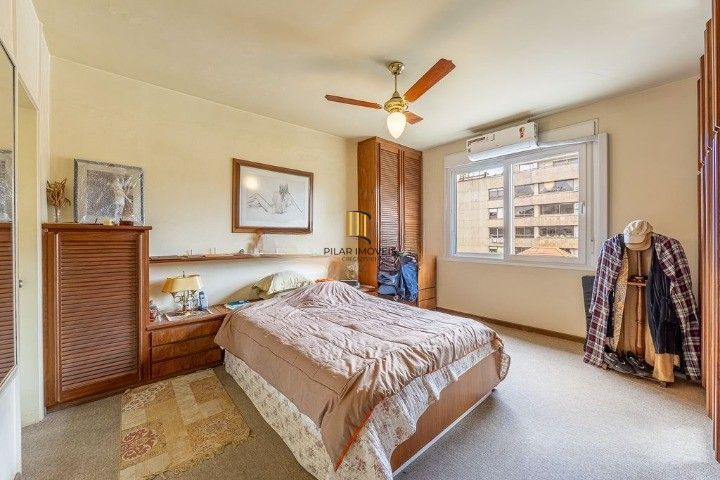 Cobertura no Bairro Auxiliadora, 3 dormitórios, 1 suíte, churrasqueira e vaga coberta.