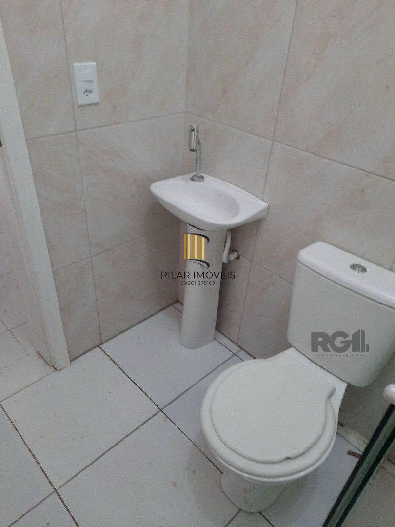 Oportunidade Imperdível: Prédio com 4 Apartamentos, Pátio e 2 Vagas de Garagem