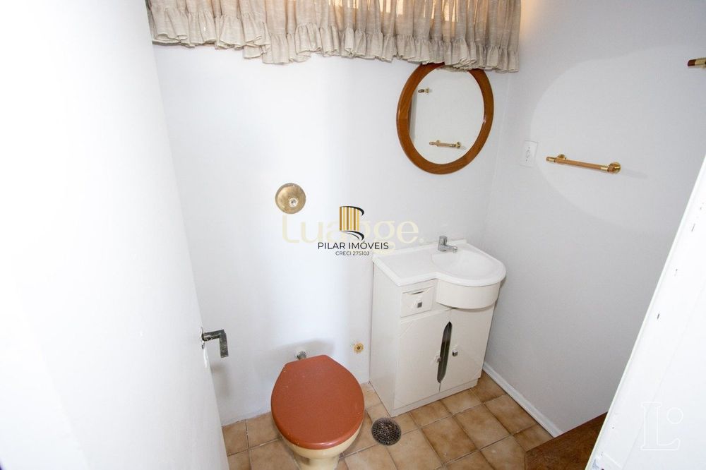 Sala comercial com 22m² de área privativa, frente, piso cerâmico, equipada com lavabo e ar-condicionado split