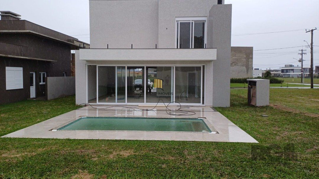 Casa de Condomínio 4 dormitórios no bairro Praia da Conceição