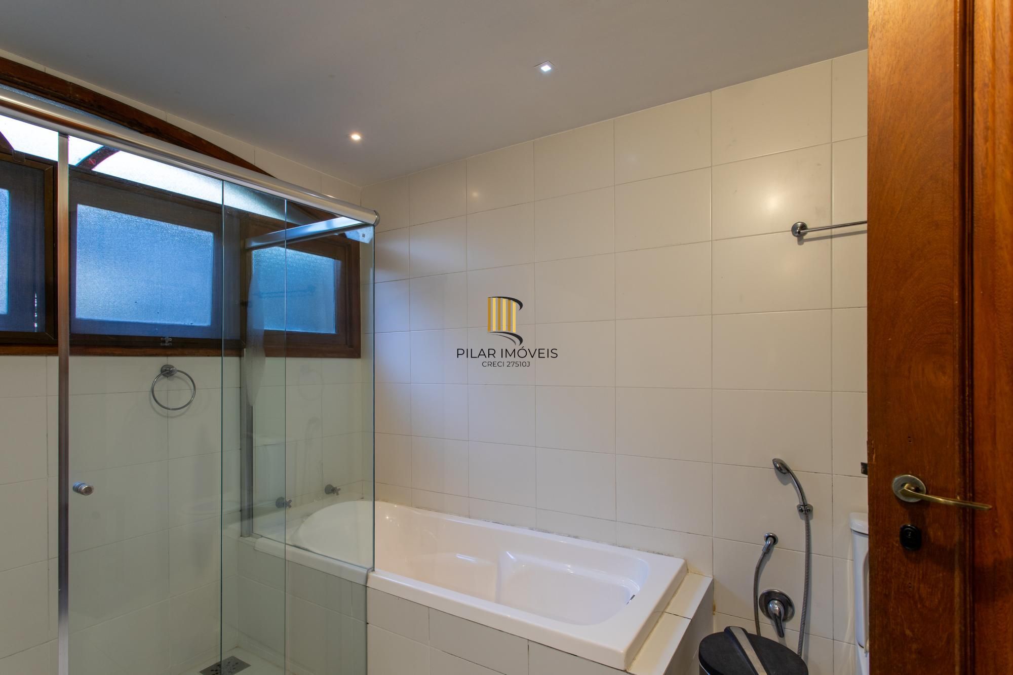 Casa em Condomínio à venda com 5 dormitórios, 565m² e 4 vagas no Condominio Jardim do Sol, Zona Sul de Porto Alegre