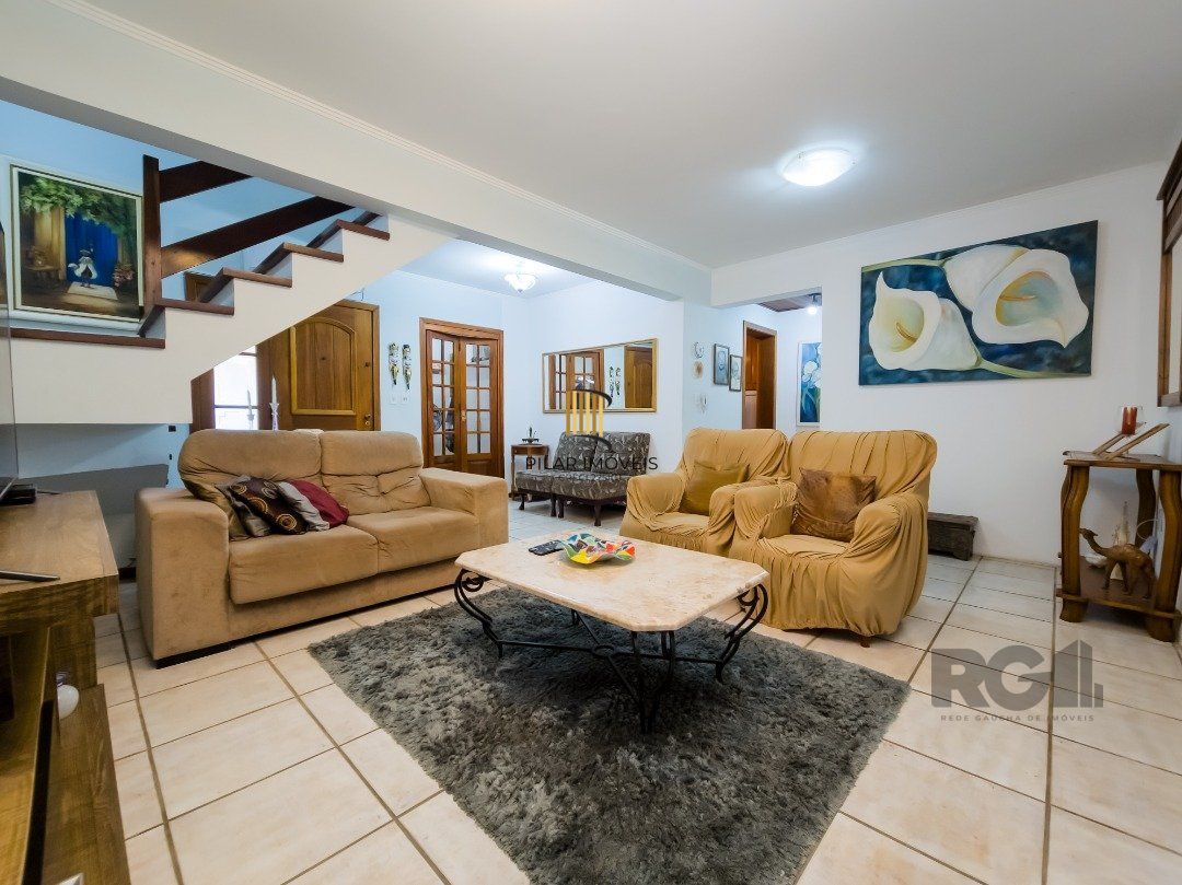 Casa de Condomínio 3 dormitórios no bairro Cavalhada