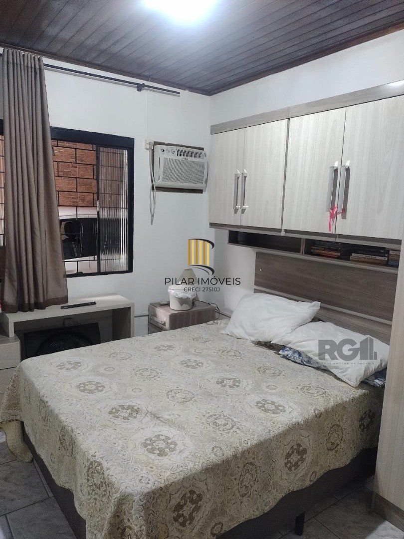 Casa de 3 dormitórios, 1 suíte e 2 vagas de garagem em Viamão.