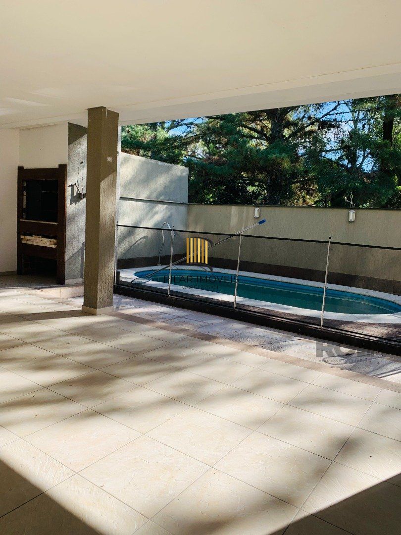 Casa de Condomínio 3 dormitórios no bairro Lomba do Pinheiro