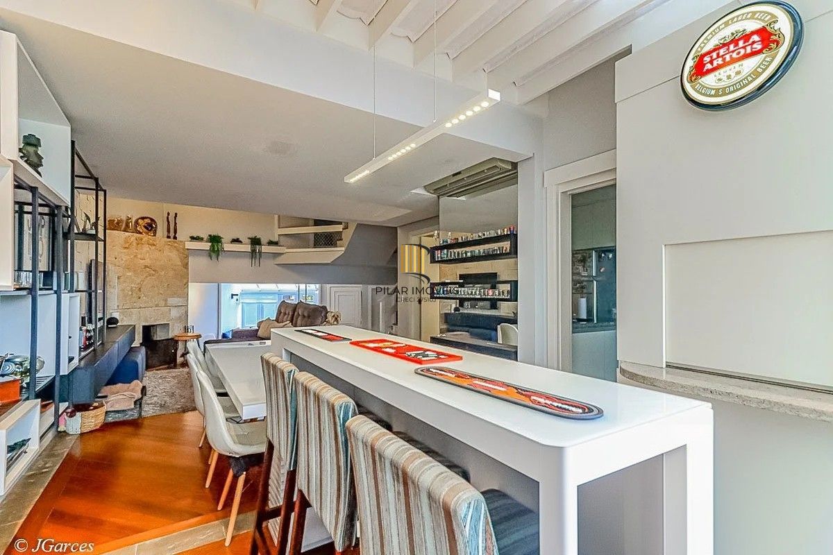 Casa em Condomínio à venda com 286m², 3 dormitórios, 1 suíte, 3 vagas, no bairro Jardim Isabel em Porto Alegre