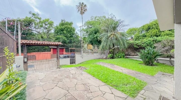 Casa de 3 dormitórios, 1 suíte e 3 vagas de garagem, bairro Ipanema.