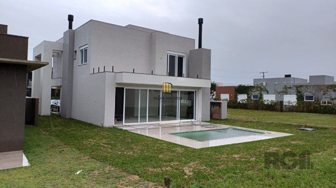Casa de Condomínio 4 dormitórios no bairro Praia da Conceição