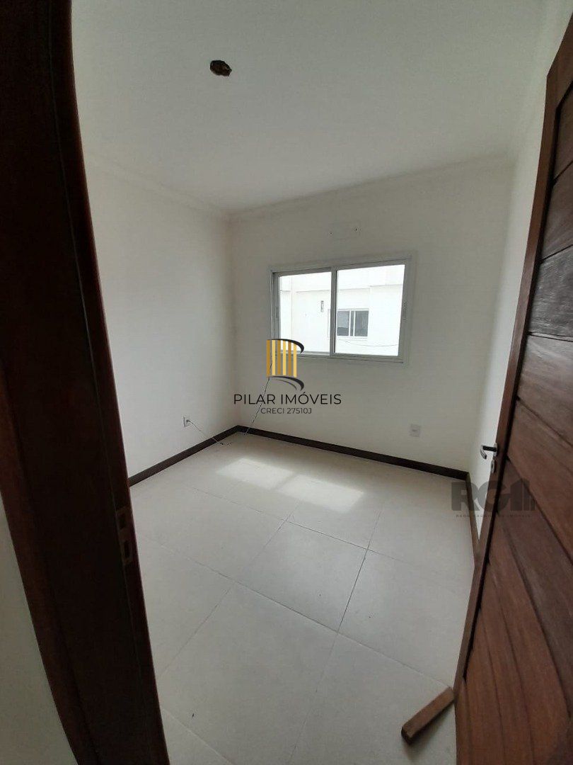 Casa de Condomínio 3 dormitórios no bairro Camaquã