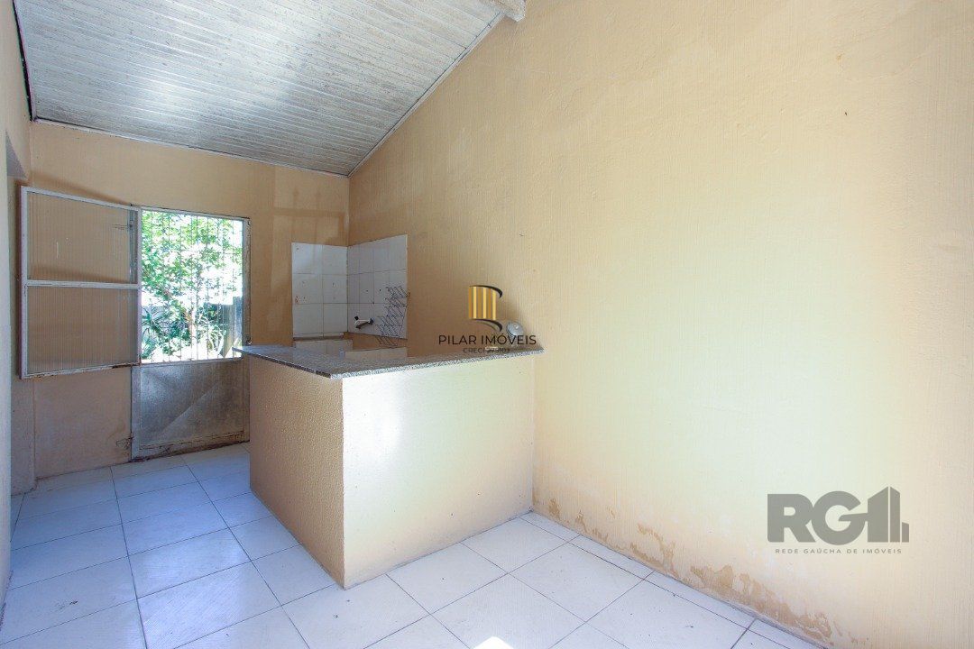 Casa de 2  dormitórios 1 vaga e um amplo pátio na Hípica Porto Alegre 