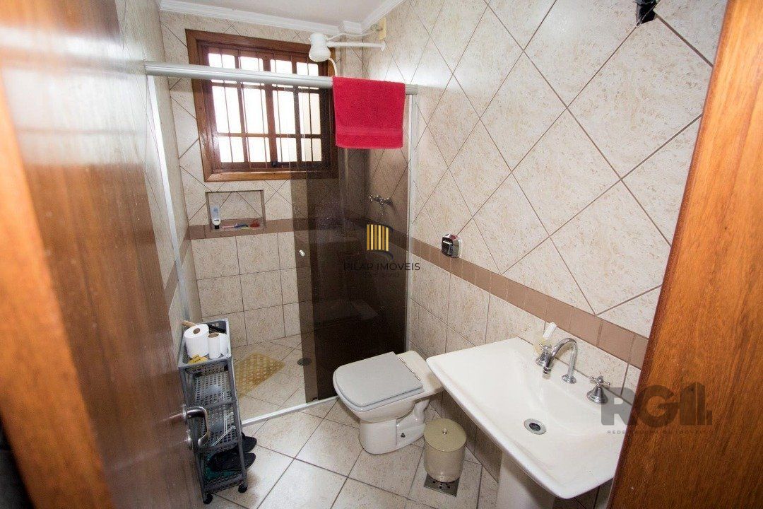 Sobrado com 6 suites, lareira, lavabo, pátio - Bairro Belém Velho
