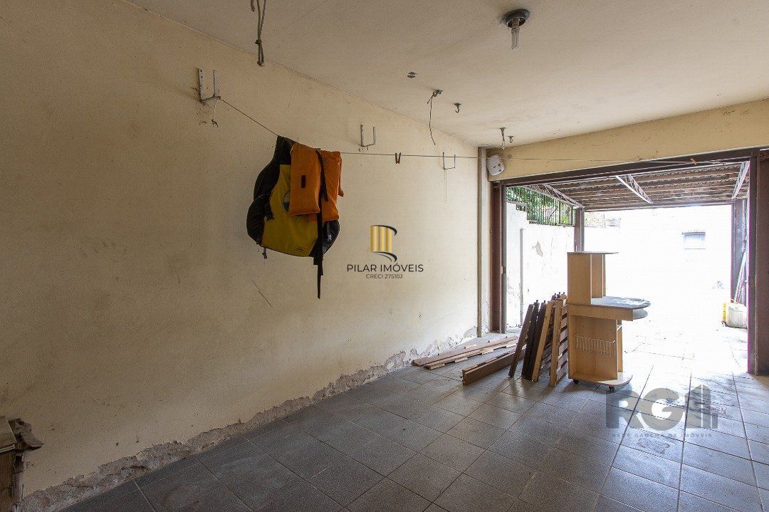 Casa 5 dormitórios no bairro Ipanema