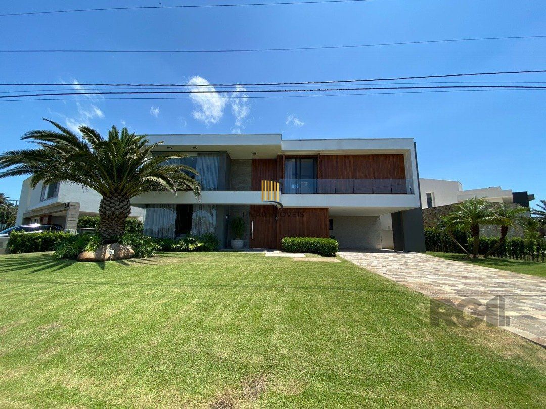 Casa de Condomínio 5 dormitórios no bairro Atlântida Sul - Pilar Imóveis