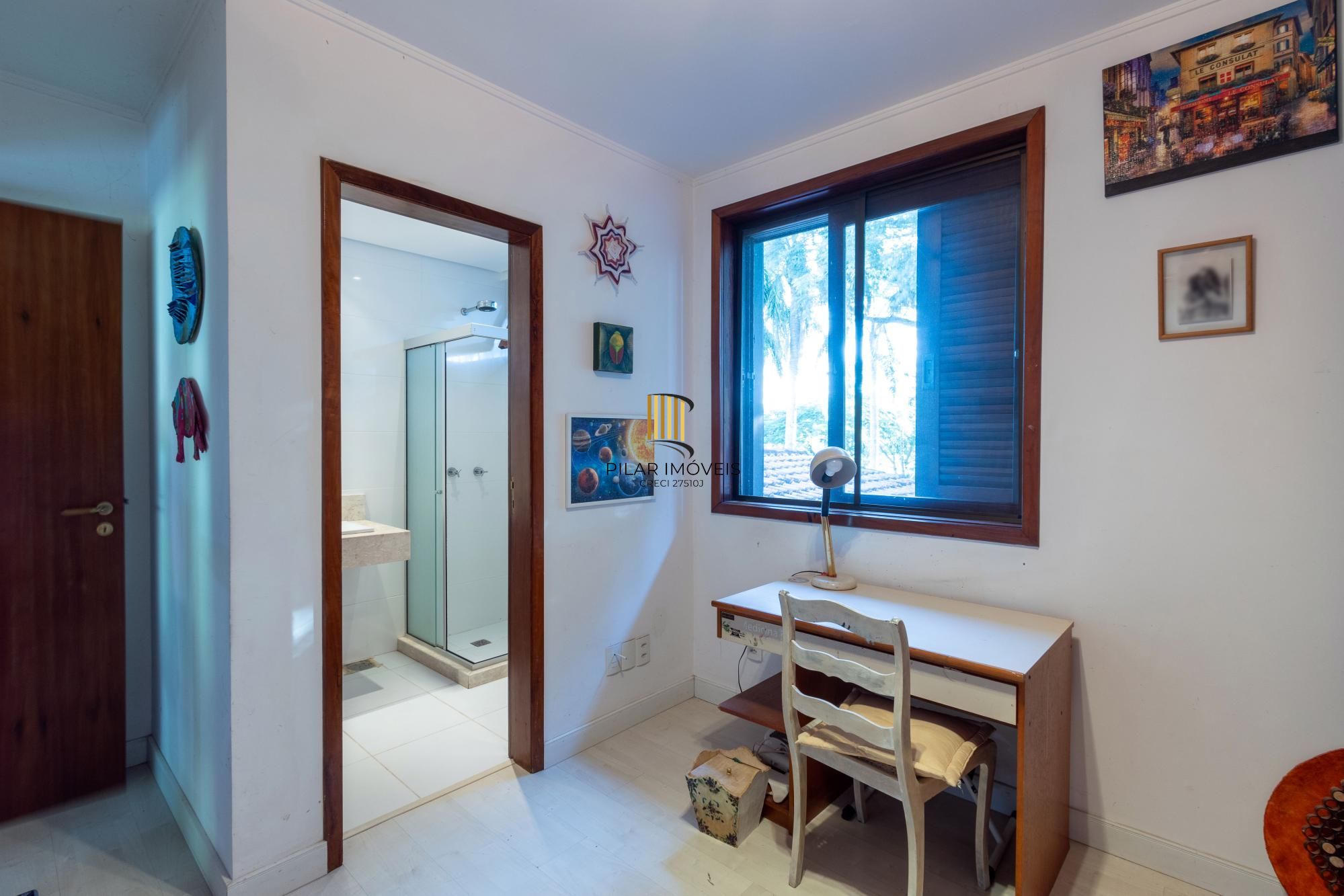 Casa de Condomínio 4 dormitórios no bairro Cavalhada