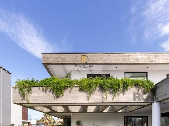 Casa 5 dormitórios no bairro Atlântida