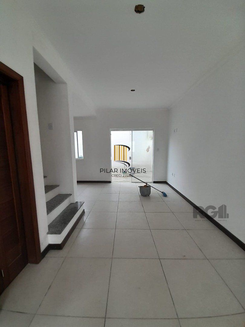 Casa de Condomínio 3 dormitórios no bairro Camaquã
