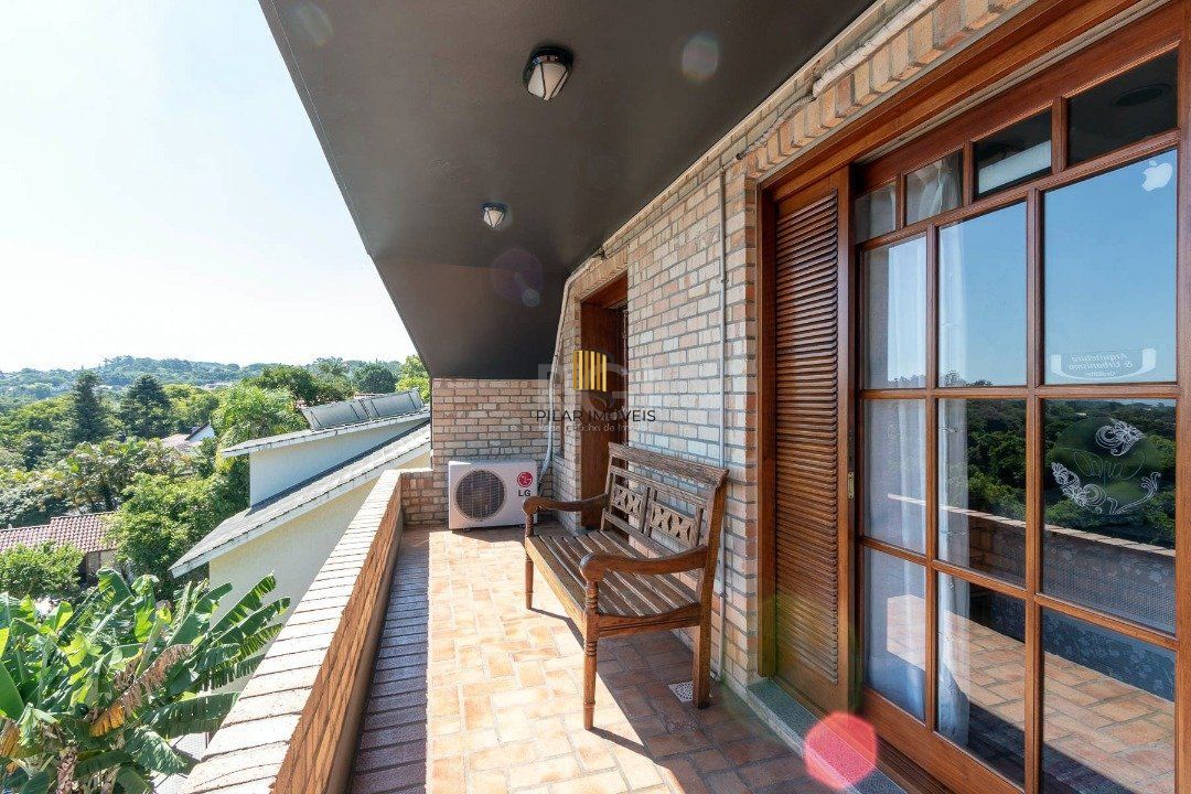 Casa Condominio para Venda - 559m², 4 dormitórios, sendo 3 suites, 3 vagas - Cavalhada