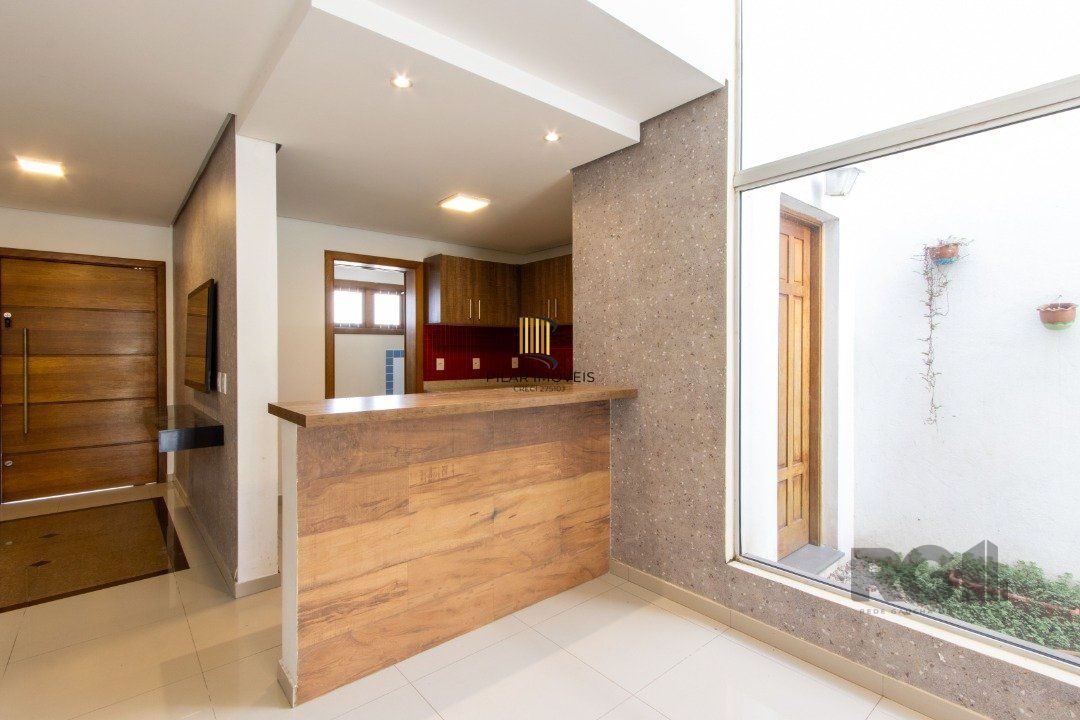 Casa 3 dormitórios no bairro Hípica