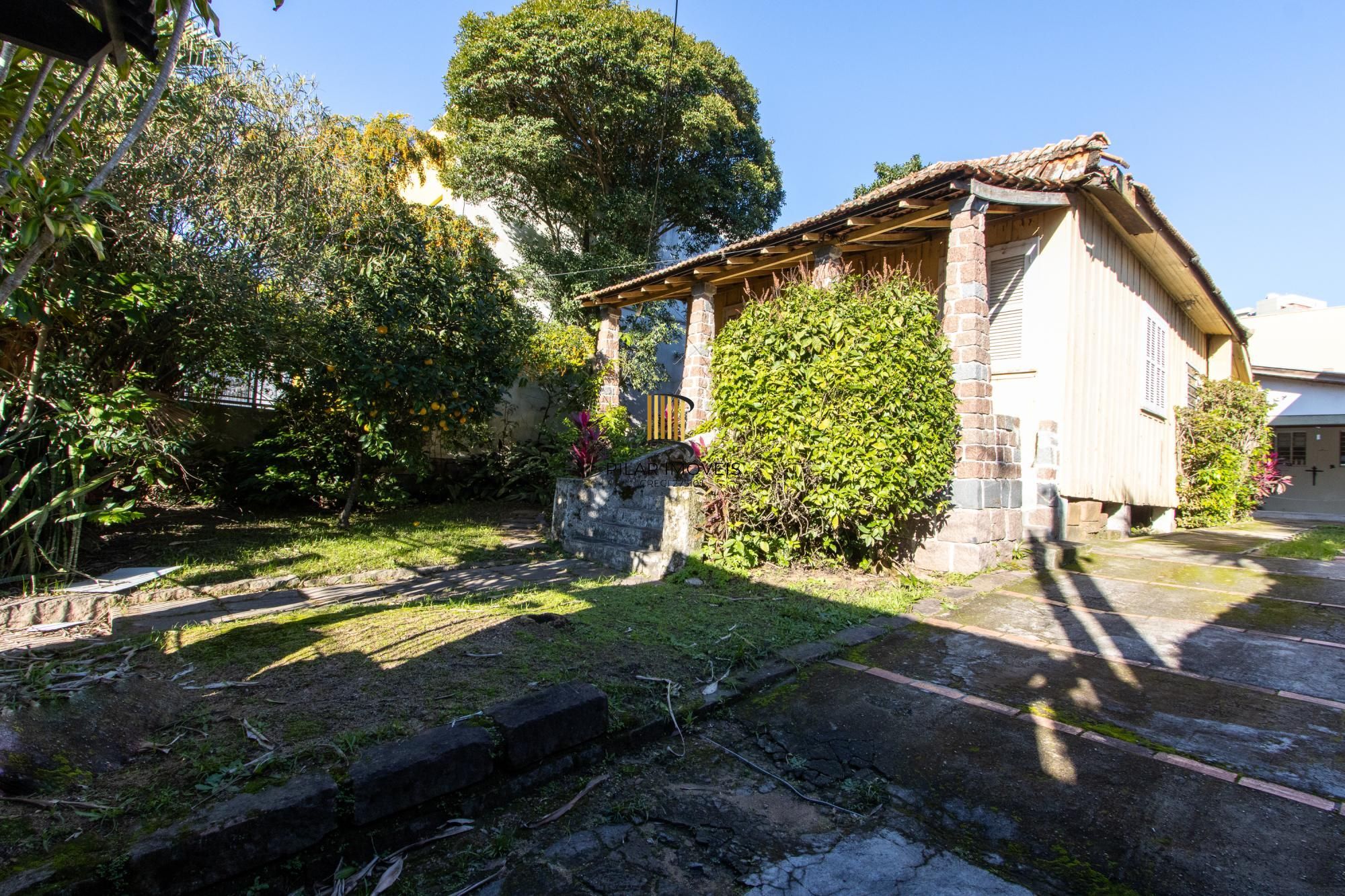 Casa de alvenaria com 104,37m² 3 dormitórios sendo 1 suíte, 2 vagas cobertas - Pilar Imóveis