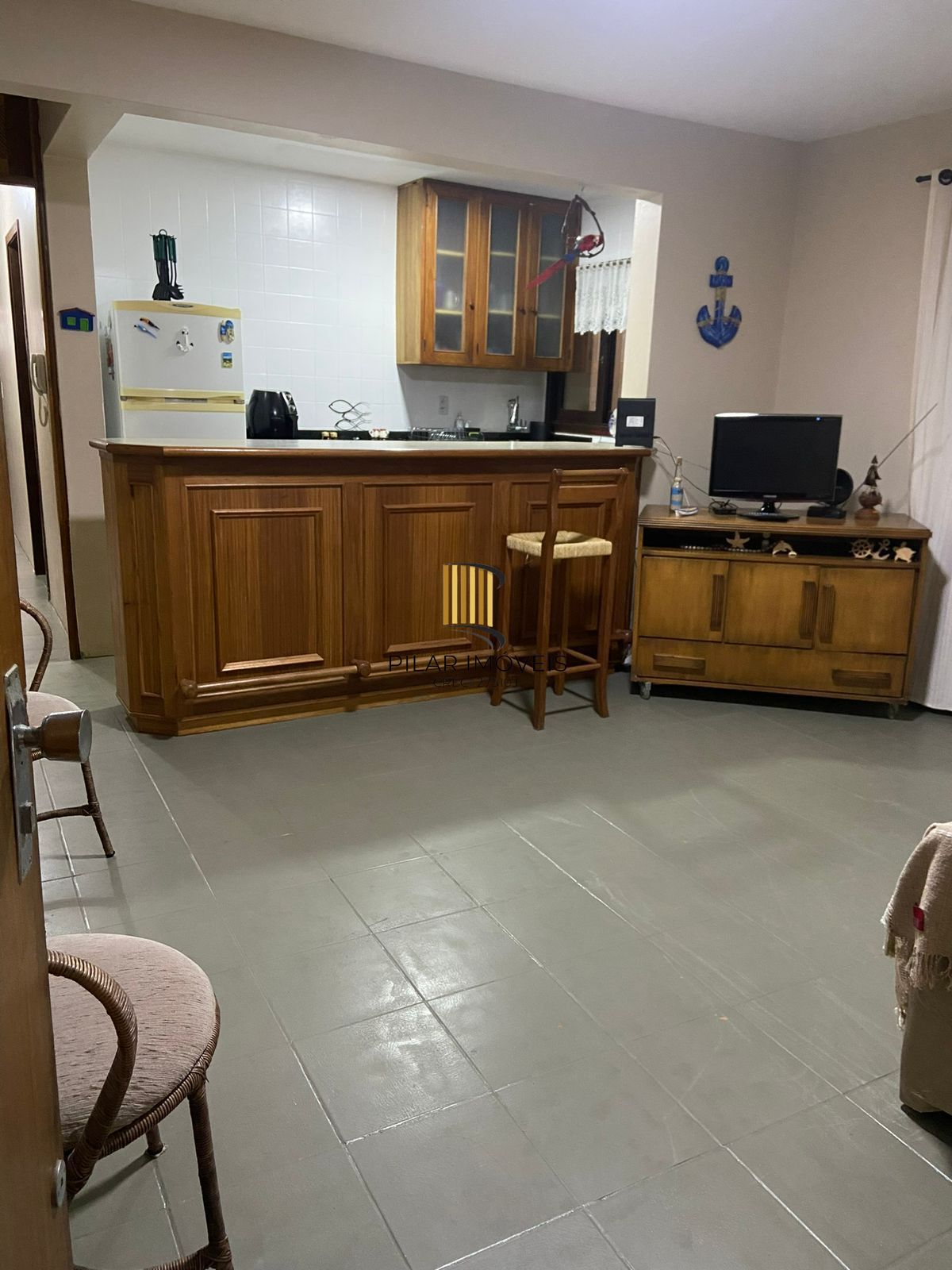 Apartamento com 2 dormitórios e garagem em Torres