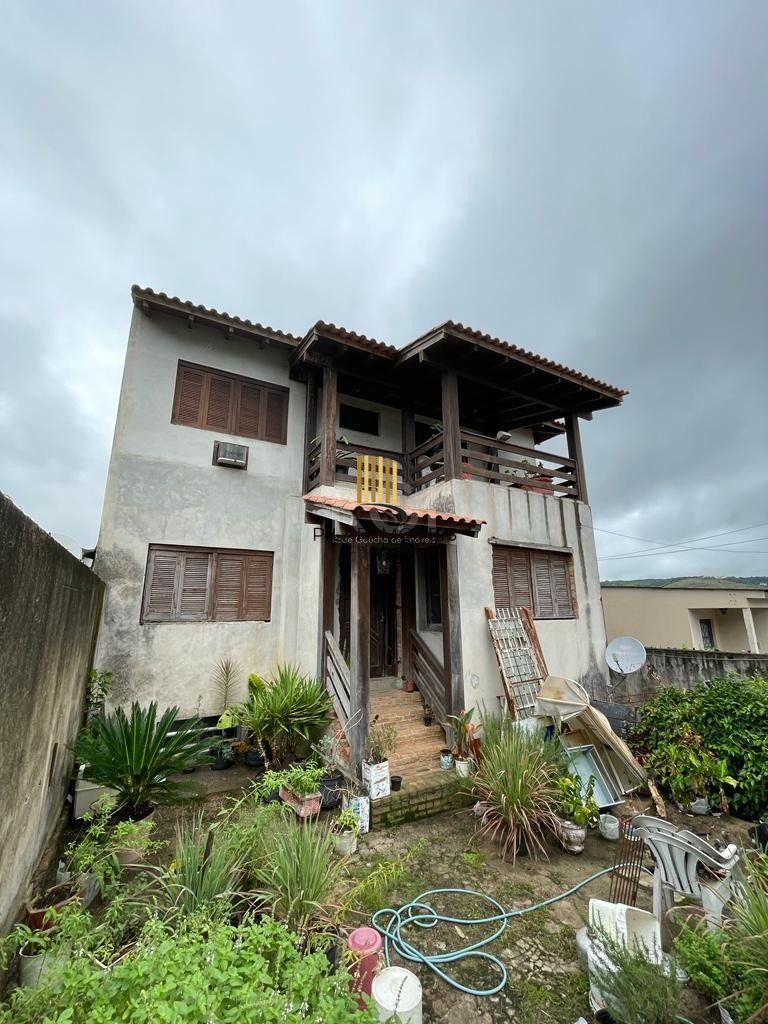 Casa 6 dormitórios no bairro Partenon - Pilar Imóveis