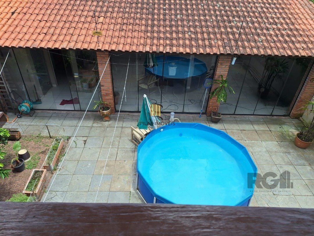 Casa 3 dormitórios no bairro Jardim Algarve