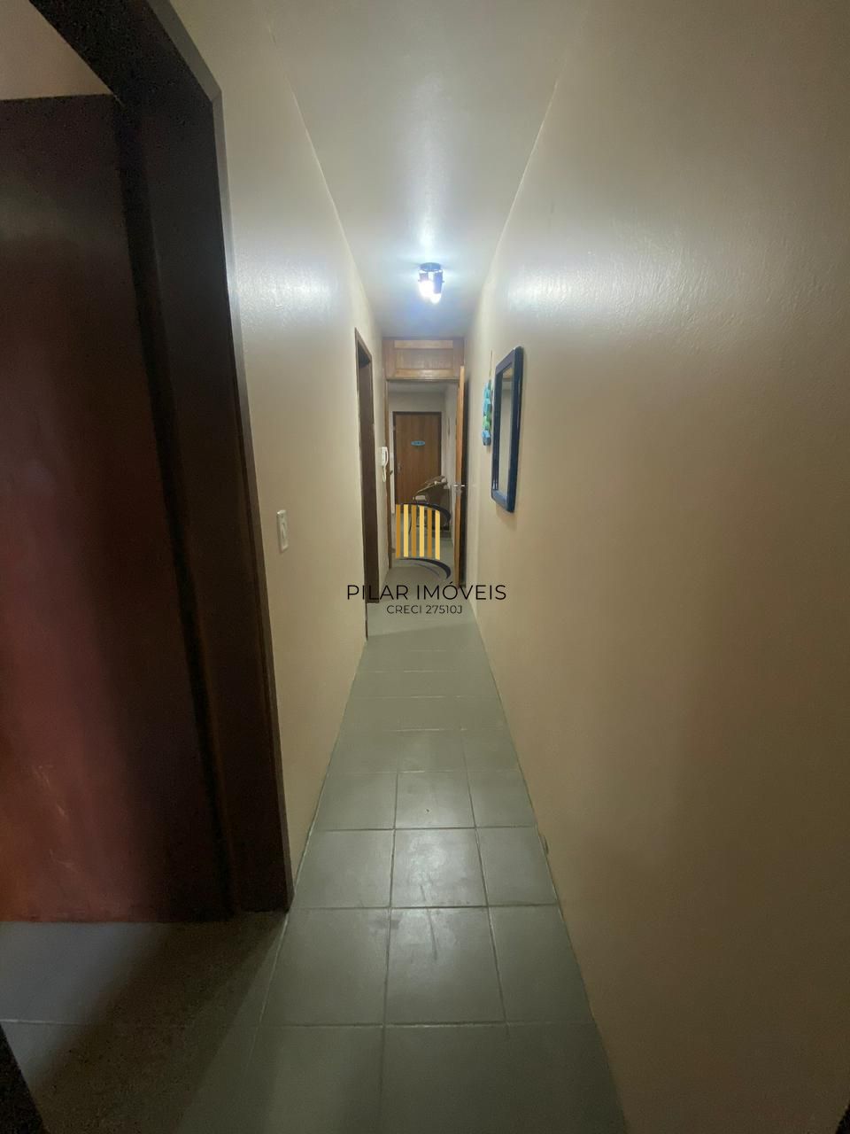 Apartamento com 2 dormitórios e garagem em Torres