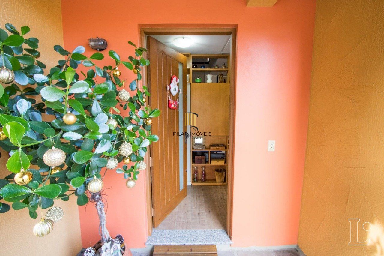 Casa de Condomínio 4 dormitórios no bairro Cavalhada