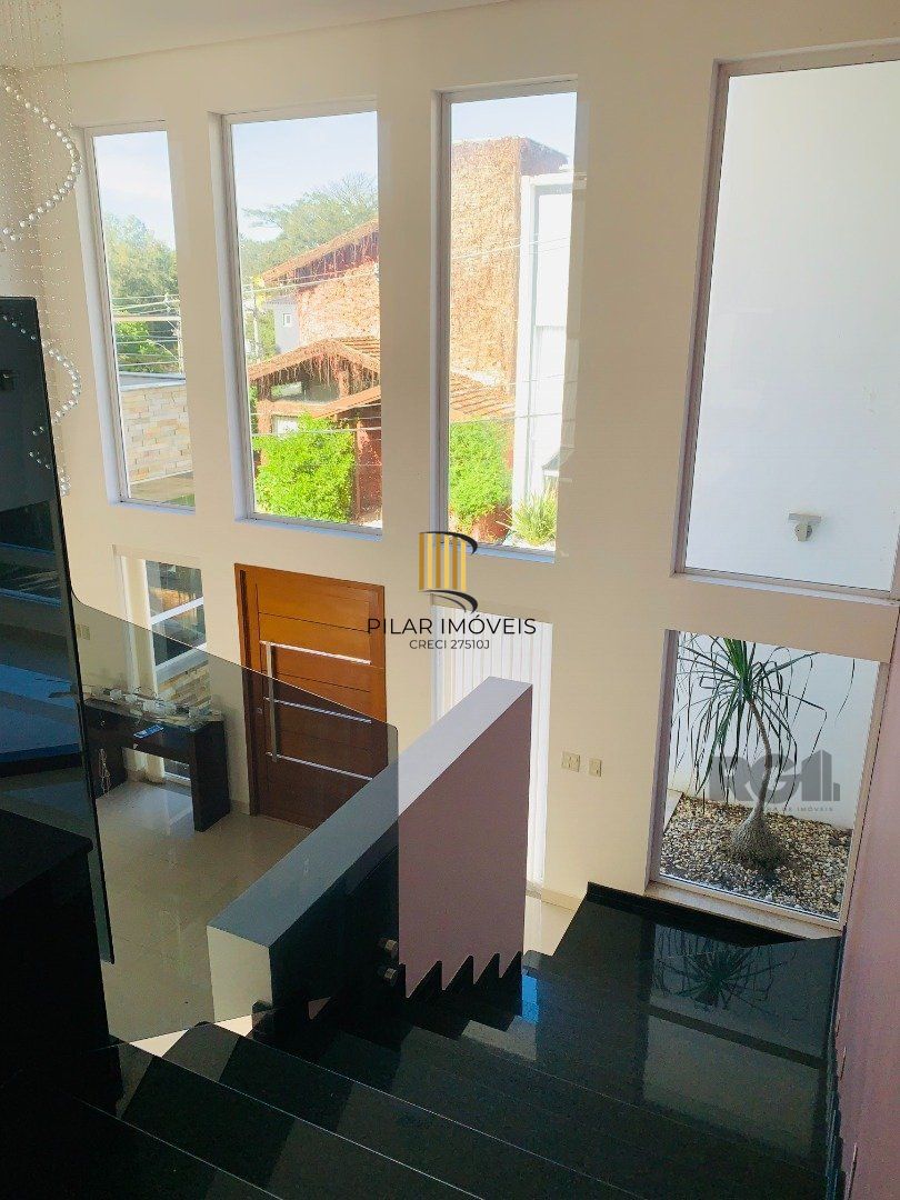 Casa de Condomínio 3 dormitórios no bairro Lomba do Pinheiro
