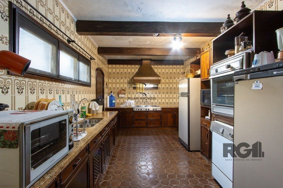 Casa para Venda - 580m², 3 dormitórios, sendo 1 suites, 3 vagas - Santa Tereza