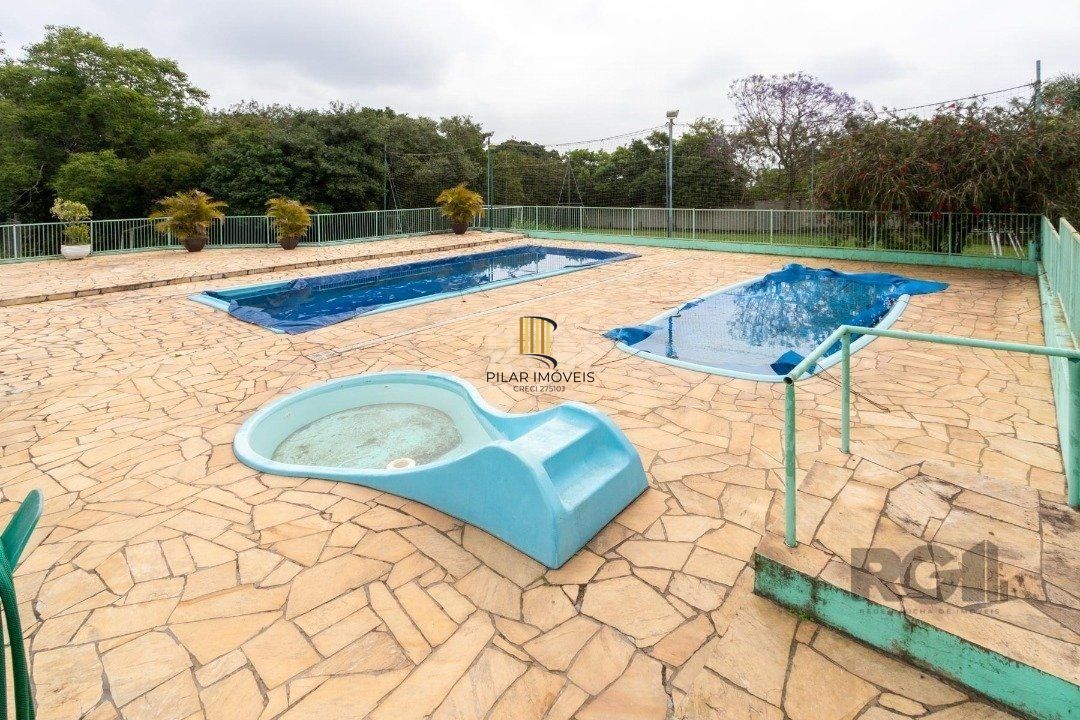 Casa de Condomínio 4 dormitórios no bairro Cavalhada