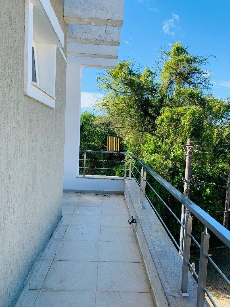 Casa de Condomínio 3 dormitórios no bairro Lomba do Pinheiro