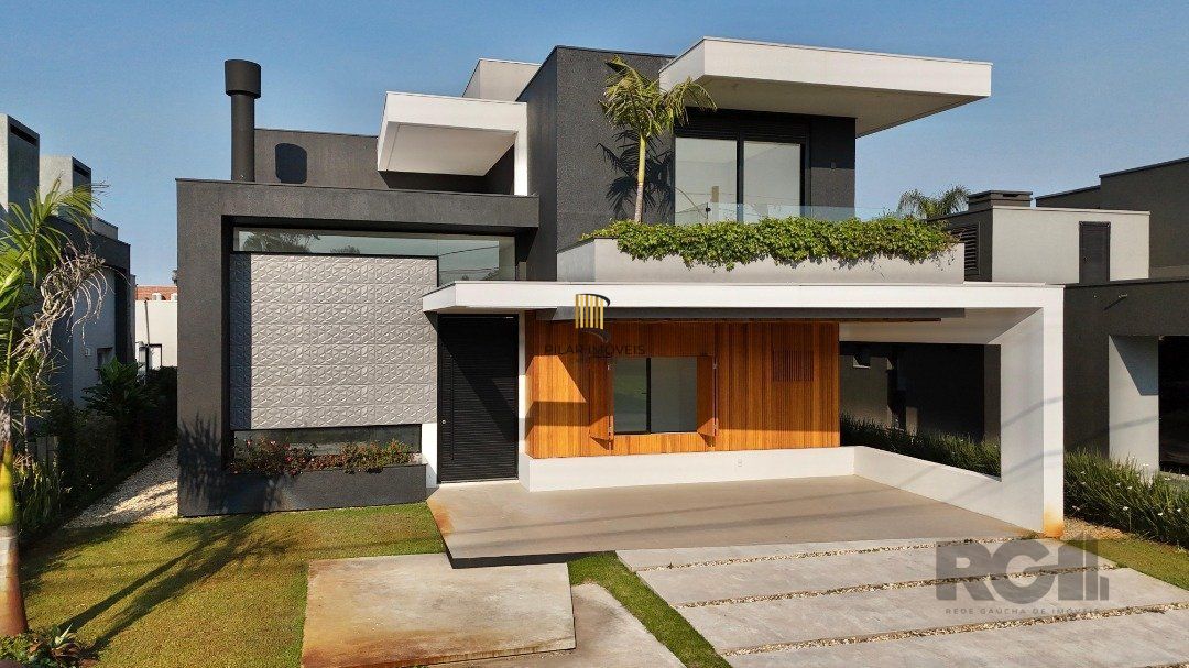 Casa de Condomínio 3 dormitórios no bairro Dubai